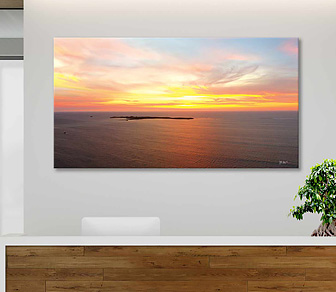 Vanilla Skies over Penguin Island, Shoalwater Islands Marine Park in Rockingham WA is and aerial photograph of a breathtaking sunset off WA's amazing coastline available in a selection of canvas sizes.